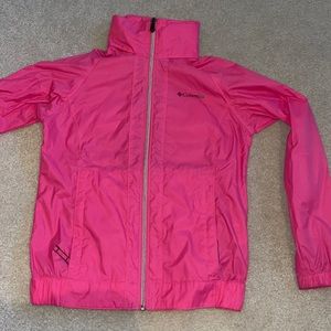 Bright pink Columbia wind breaker